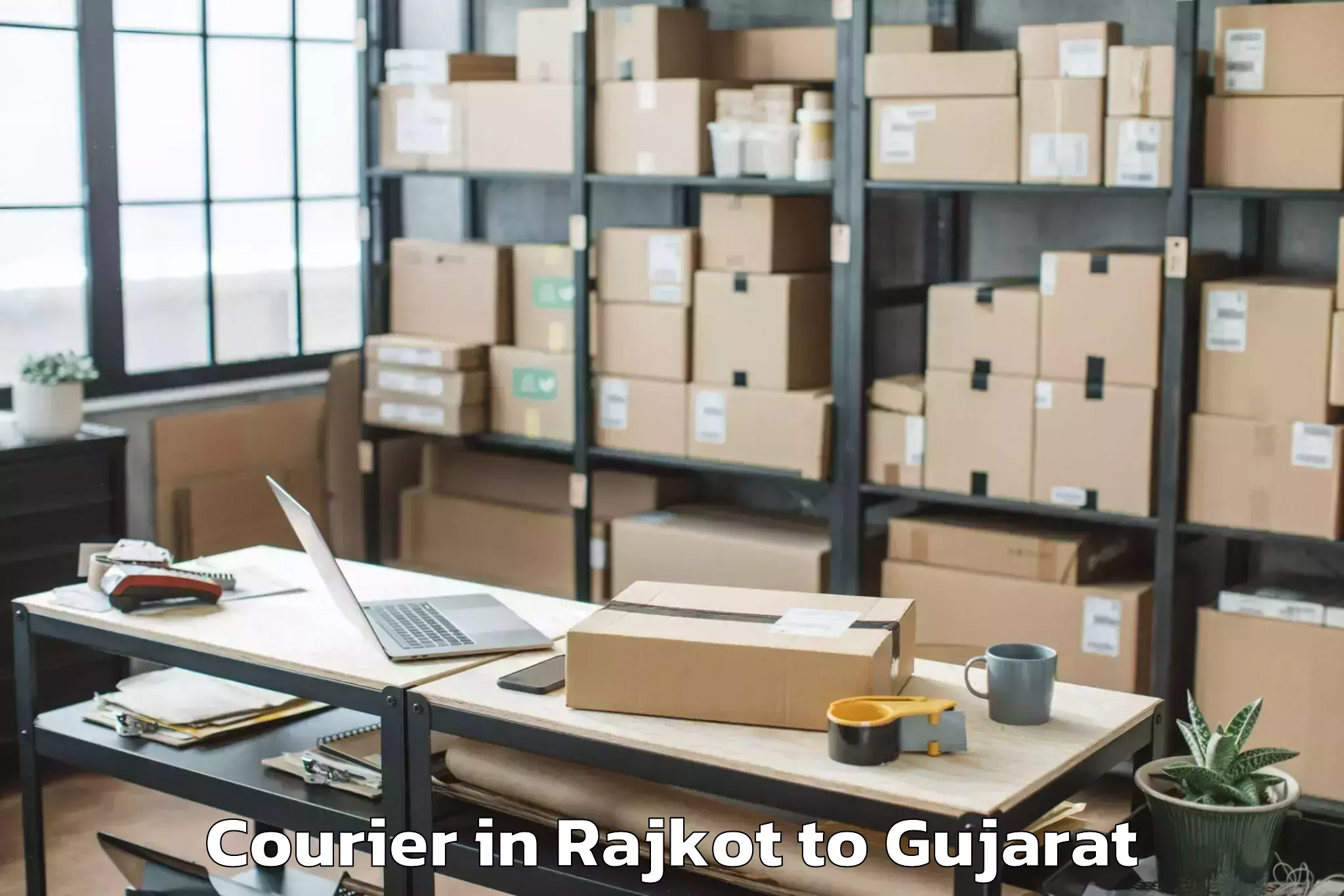 Reliable Rajkot to Garbada Courier